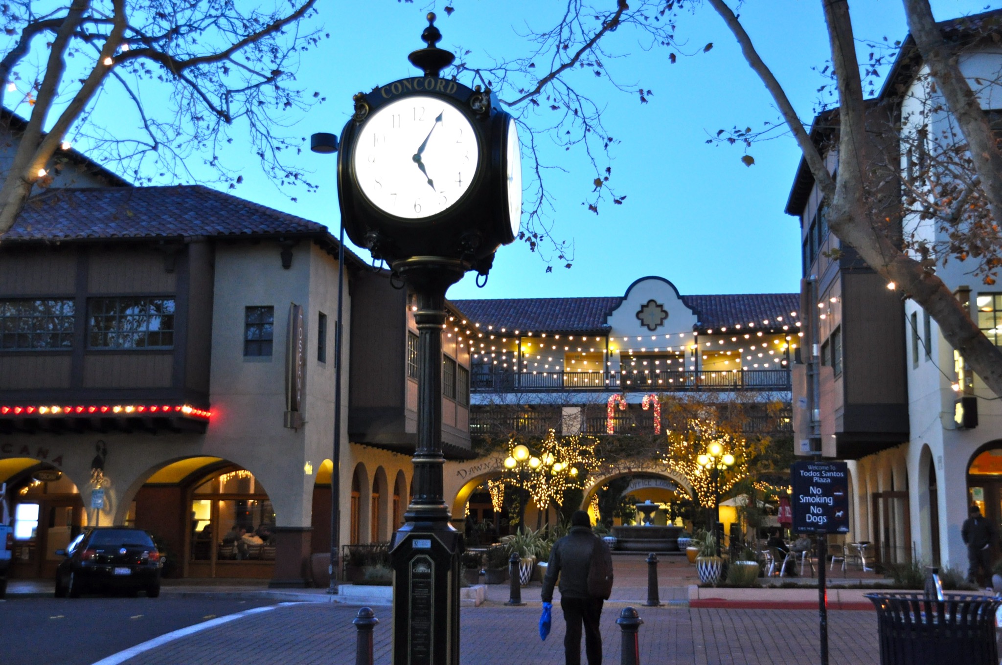 Todos Santos Plaza in downtown Concord at dusk, with the Concord clock in the foreground.
