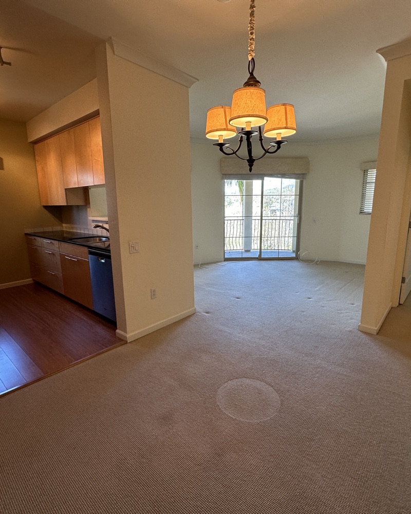A dining room with a chandelier in a Walnut Creek rental managed by Bay Vista PM.